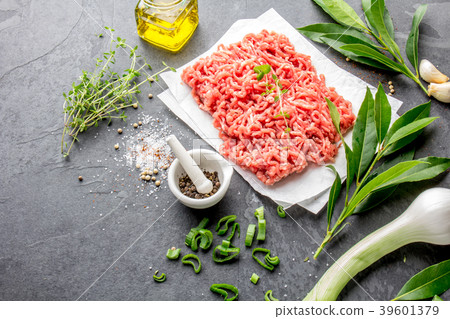 Mince. Ground meat with ingredients for cooking on 39601379