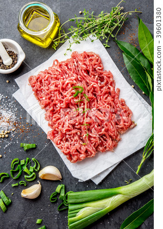 Mince. Ground meat with ingredients for cooking on Mince. Ground meat with ingredients for cooking on 39601380