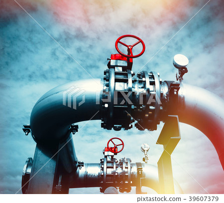 Steel pipelines and valves against blue sky 39607379