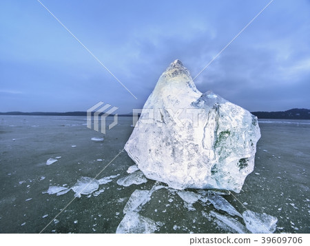 Image of pieces of ice and drops on frost ground. Image of pieces of ice and drops on frost ground. 39609706