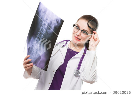 Attractive young woman doctor looking at x-ray 39610056