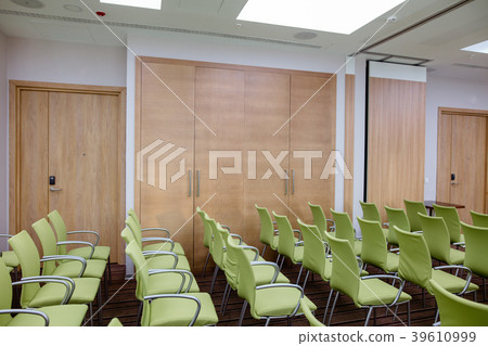 concert hall with stylish green chairs, wooden 39610999