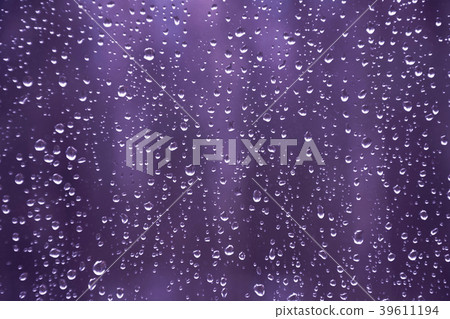 Rain drops on the window in ultra violet color. Rain drops on the window in ultra violet color. 39611194