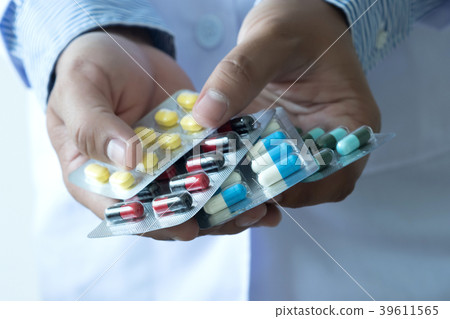 health care  holding at drugstore Pack birth  39611565