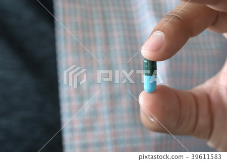 Medicine and health care concept man pours Medicine and health care concept man pours 39611583