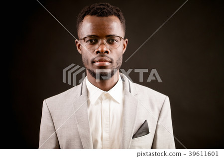 close up portrait of attractive unshaven African 39611601