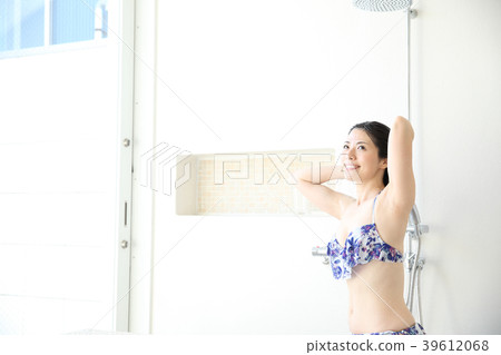 Woman taking a shower 39612068