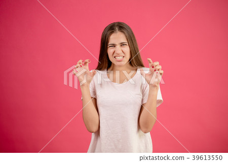 young funny female pretending a cat. like an angry 39613550
