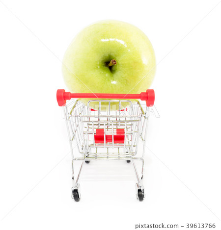 Shopping cart with big green apple on white 39613766