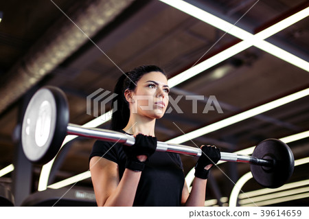fitness, close up of young woman pick up for 39614659