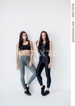 Full-length view of two young beautiful athletic 39615036