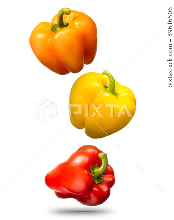 Falling bell peppers isolated on white background Falling bell peppers isolated on white background 39616506