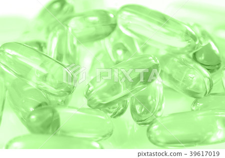 Soft gelatin capsule background. Soft gelatin capsule background. 39617019