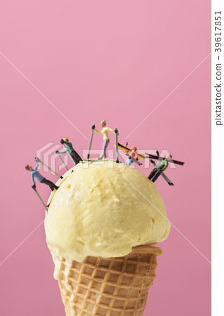 miniature skier on an ice cream 39617851
