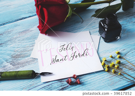 rose and text happy Saint George Day in Catalan 39617852