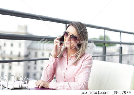 business concept - businesswoman talking on the business concept - businesswoman talking on the 39617929