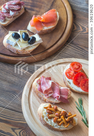 Crostini with different toppings Crostini with different toppings 39619620
