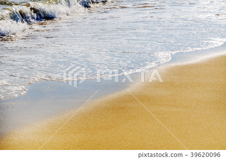 close up of the sea water affecting the sand close up of the sea water affecting the sand 39620096