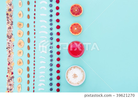 Breakfast with berries and nuts on mint background 39621270