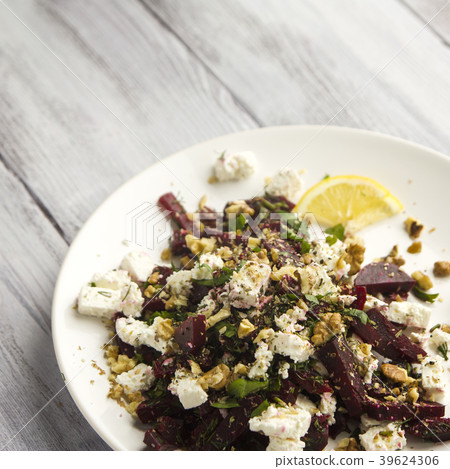 Beetroot salad with cottage cheese and walnuts. Beetroot salad with cottage cheese and walnuts. 39624306