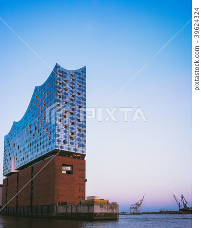 Elbphilharmonie on bright blue sky with some lilac Elbphilharmonie on bright blue sky with some lilac 39624324
