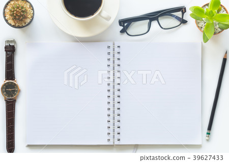 Top view of an desk office table. White office des Top view of an desk office table. White office des 39627433