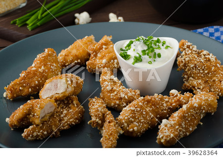 Chicken strips in popcorn breadcrumbs 39628364