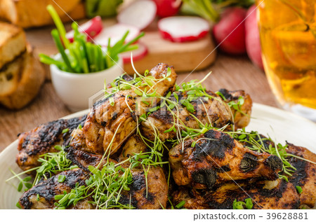 Grilled teriyaki chicken wings 39628881