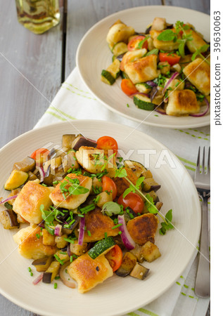 Homemade gnocchi with Mediterranean vegetables Homemade gnocchi with Mediterranean vegetables 39630063