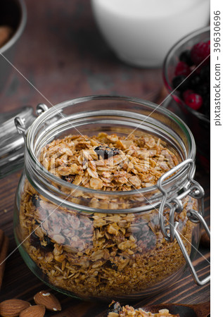 Baked granola with berries 39630696