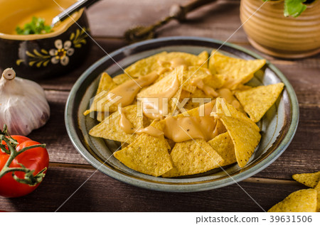 Nachos with homemade cheese dip Nachos with homemade cheese dip 39631506