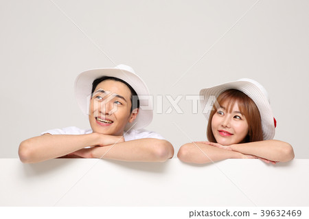 Happy young traveler couple concept photo. set out on a trip to honeymoon, camping and summer vacation concept isolated on white background. 490 Happy young traveler couple concept photo. set out on a trip to honeymoon, camping and summer vacation concept isolated on white background. 490 39632469