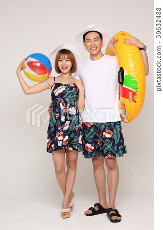 Happy young traveler couple concept photo. set out on a trip to honeymoon, camping and summer vacation concept isolated on white background. 446 Happy young traveler couple concept photo. set out on a trip to honeymoon, camping and summer vacation concept isolated on white background. 446 39632488