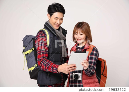 Happy young traveler couple concept photo. set out on a trip to honeymoon, camping and summer vacation concept isolated on white background. 403 Happy young traveler couple concept photo. set out on a trip to honeymoon, camping and summer vacation concept isolated on white background. 403 39632522