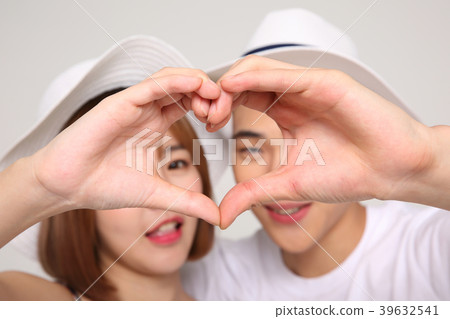 Happy young traveler couple concept photo. set out on a trip to honeymoon, camping and summer vacation concept isolated on white background. 468 Happy young traveler couple concept photo. set out on a trip to honeymoon, camping and summer vacation concept isolated on white background. 468 39632541