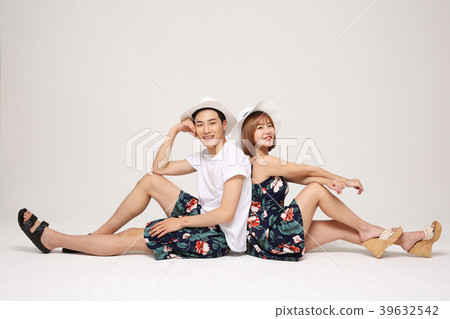 Happy young traveler couple concept photo. set out on a trip to honeymoon, camping and summer vacation concept isolated on white background. 486 Happy young traveler couple concept photo. set out on a trip to honeymoon, camping and summer vacation concept isolated on white background. 486 39632542