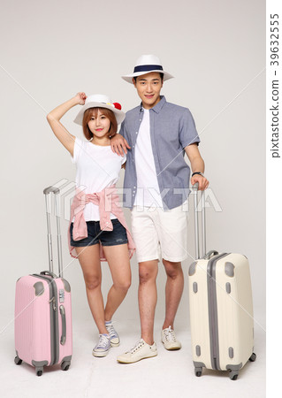 Happy young traveler couple concept photo. set out on a trip to honeymoon, camping and summer vacation concept isolated on white background. 418 Happy young traveler couple concept photo. set out on a trip to honeymoon, camping and summer vacation concept isolated on white background. 418 39632555