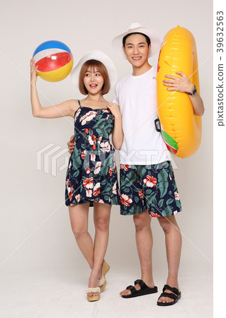 Happy young traveler couple concept photo. set out on a trip to honeymoon, camping and summer vacation concept isolated on white background. 447 Happy young traveler couple concept photo. set out on a trip to honeymoon, camping and summer vacation concept isolated on white background. 447 39632563