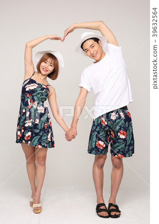 Happy young traveler couple concept photo. set out on a trip to honeymoon, camping and summer vacation concept isolated on white background. 467 Happy young traveler couple concept photo. set out on a trip to honeymoon, camping and summer vacation concept isolated on white background. 467 39632564