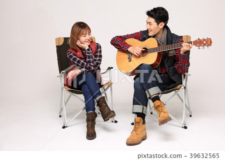 Happy young traveler couple concept photo. set out on a trip to honeymoon, camping and summer vacation concept isolated on white background. 413 Happy young traveler couple concept photo. set out on a trip to honeymoon, camping and summer vacation concept isolated on white background. 413 39632565