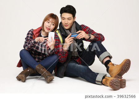 Happy young traveler couple concept photo. set out on a trip to honeymoon, camping and summer vacation concept isolated on white background. 380 Happy young traveler couple concept photo. set out on a trip to honeymoon, camping and summer vacation concept isolated on white background. 380 39632566