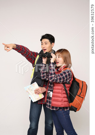 Happy young traveler couple concept photo. set out on a trip to honeymoon, camping and summer vacation concept isolated on white background. 395 Happy young traveler couple concept photo. set out on a trip to honeymoon, camping and summer vacation concept isolated on white background. 395 39632579
