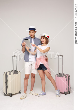 Happy young traveler couple concept photo. set out on a trip to honeymoon, camping and summer vacation concept isolated on white background. 426 39632583