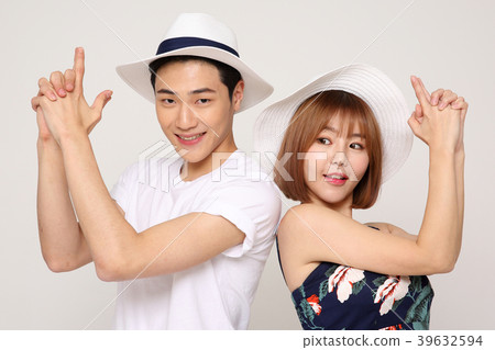 Happy young traveler couple concept photo. set out on a trip to honeymoon, camping and summer vacation concept isolated on white background. 456 Happy young traveler couple concept photo. set out on a trip to honeymoon, camping and summer vacation concept isolated on white background. 456 39632594