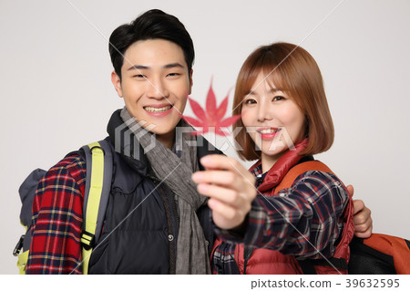 Happy young traveler couple concept photo. set out on a trip to honeymoon, camping and summer vacation concept isolated on white background. 393 39632595