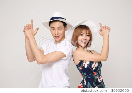 Happy young traveler couple concept photo. set out on a trip to honeymoon, camping and summer vacation concept isolated on white background. 455 Happy young traveler couple concept photo. set out on a trip to honeymoon, camping and summer vacation concept isolated on white background. 455 39632600