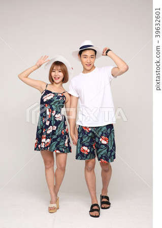 Happy young traveler couple concept photo. set out on a trip to honeymoon, camping and summer vacation concept isolated on white background. 450 Happy young traveler couple concept photo. set out on a trip to honeymoon, camping and summer vacation concept isolated on white background. 450 39632601