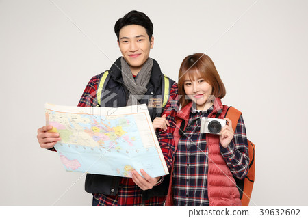 Happy young traveler couple concept photo. set out on a trip to honeymoon, camping and summer vacation concept isolated on white background. 385 Happy young traveler couple concept photo. set out on a trip to honeymoon, camping and summer vacation concept isolated on white background. 385 39632602