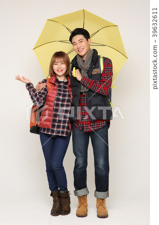 Happy young traveler couple concept photo. set out on a trip to honeymoon, camping and summer vacation concept isolated on white background. 383 Happy young traveler couple concept photo. set out on a trip to honeymoon, camping and summer vacation concept isolated on white background. 383 39632611