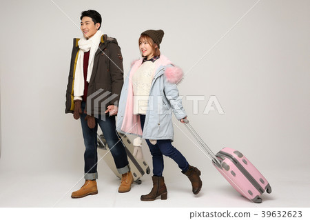 Happy young traveler couple concept photo. set out on a trip to honeymoon, camping and summer vacation concept isolated on white background. 336 Happy young traveler couple concept photo. set out on a trip to honeymoon, camping and summer vacation concept isolated on white background. 336 39632623